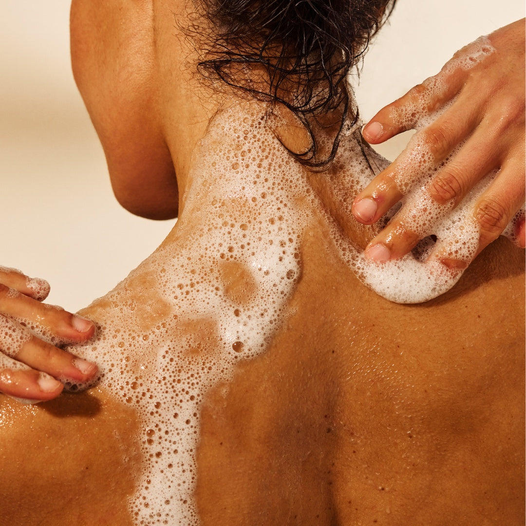 girl enjoying less is more shower gel